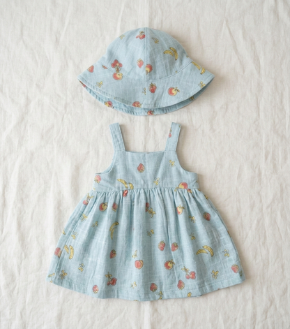 Girls’ Sky-Blue Orchard Muslin Sun Dress – Organic Cotton Fruit Print Pinafore with Matching Sun Hat - Serromi